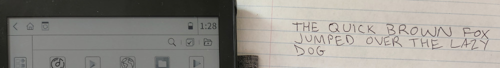 Comparison between lined paper and E701 without backlight